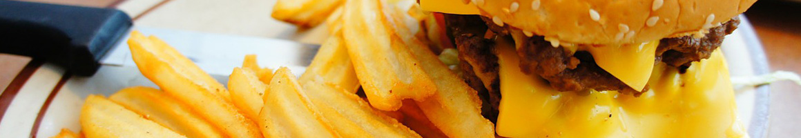 Eating Burger at Lenox Drive In restaurant in Enid, OK.